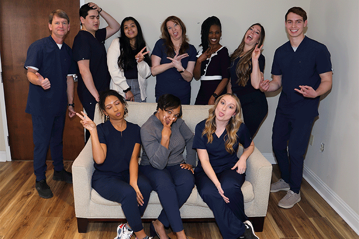 Funny group photo of the Peachtree Corners Dentistry dental team and doctors.